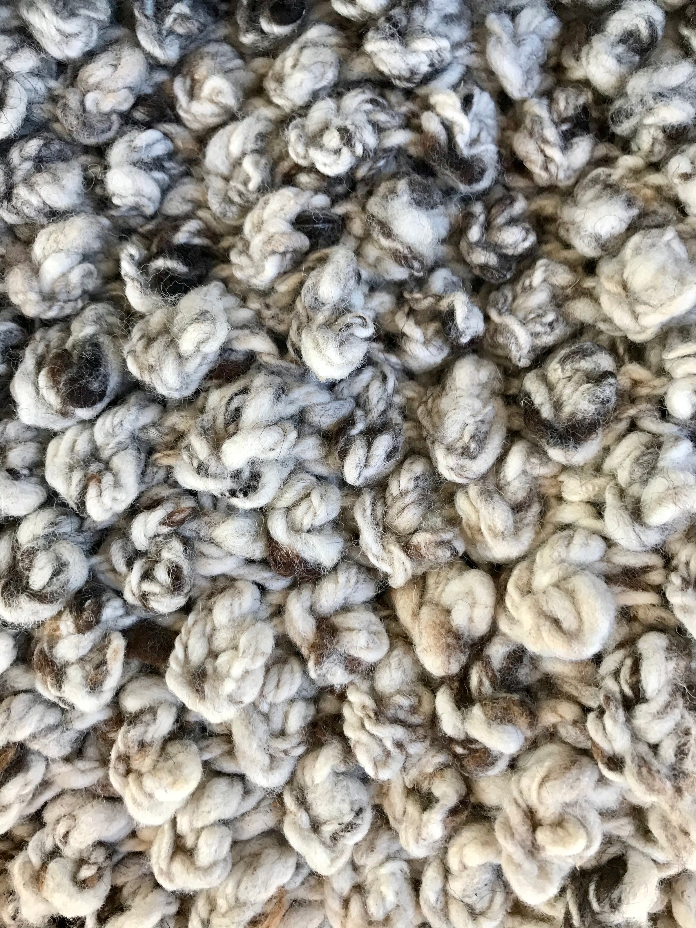 Laine mérinos bio plaid tanggoor from Kenana Knitters for Studio Matongé