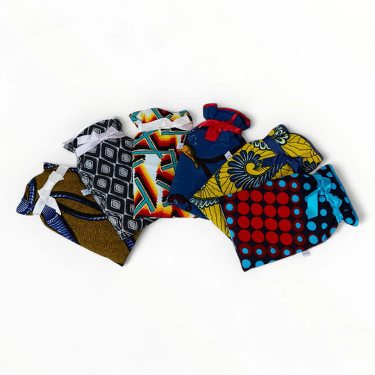 Bouillottes JAMAC avec housse molletonnée coton - wax africain - Capacité 1,8 litres - Housse 36 x 21 cm. - Studio Matongé - Disponible en plusieurs motifs et coloris.
