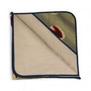 Cape de bain bébé MALAIKA en wax de coton doublé de piqué de coton gaufré nid d'abeille écru. 88 x 88 cm.