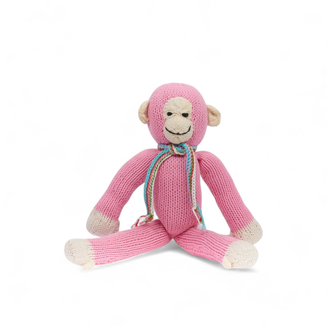 Le singe JOSEPH est disponible en 2 tailles S & M et en de nombreuses couleurs  (ici en rose bubble-gum taille M).