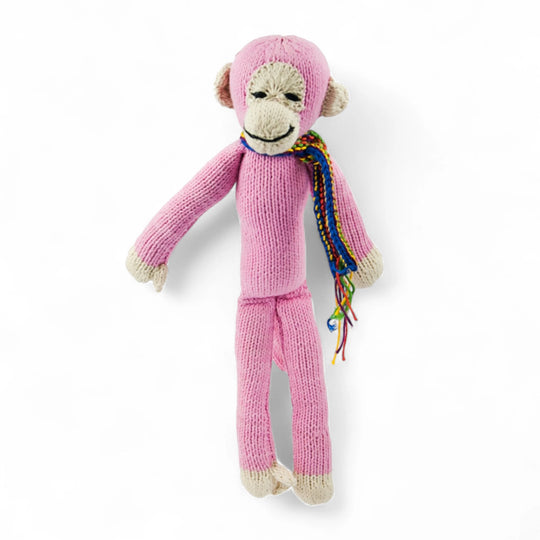 Le singe JOSEPH est disponible en 2 tailles S & M et en de nombreuses couleurs  (ici en rose bubble-gum taille M).