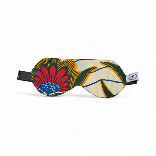 Masque de nuit wax et soie DARE – motif wax floral rouge et jaune et bleu sur fond ivoire