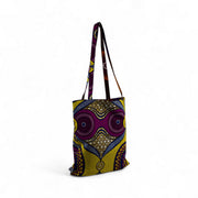 Tote bag réversible ILANGA en wax. Confectionné à la main en Belgique dans des ateliers de réinsertions professionnelle. Pur coton. Ici en combinaison solaire et graphique. 