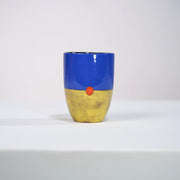 Mug MMOHO en céramique par la céramiste Sud-Africaine Clementina van der Walt pour Done d'Africa x Studio Matongé.
8 cm de diamètre et 11,5 cm de hauteur, parfait pour vos grands cafés, thés et infusions. 
Ici en combinaison Bleu Roi & Jaune Tendre