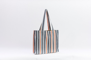 Grand shopping bag MFUKO orange et noir fait main en Fasso Dan Fani et wax par Studio Matongé. Disponible dans 2 autres teintes. 
